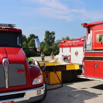 Trucks at a fill station during the water shuttle operation